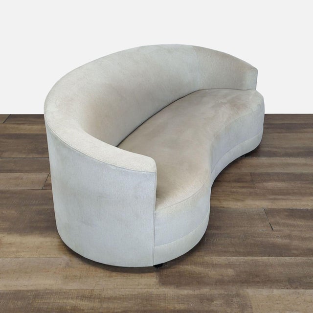 Features curved lines and modern style. Brand: Crate & Barrel. Original Price: $1529. Dimensions (in): 90W x 40D x 35H.
