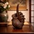 PATINATED BRONZE OKIMONO OF A STANDING ROOSTER Japan, circa late 19th century Unsigned 9 1/2" H x 3 1/4" D x 5" W This...