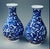 Vintage pair of Chinese decorative vases. Two matching ceramic baluster urns with painted detail, dating to the late 20th...
