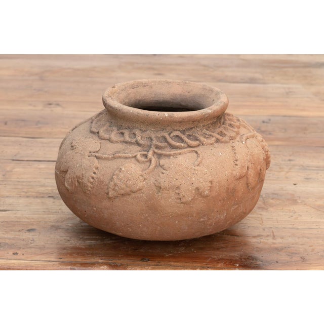 A soulful celebration of the harvest, This Dionysian water Jar is an authentic antique terracotta vessel defined by its...