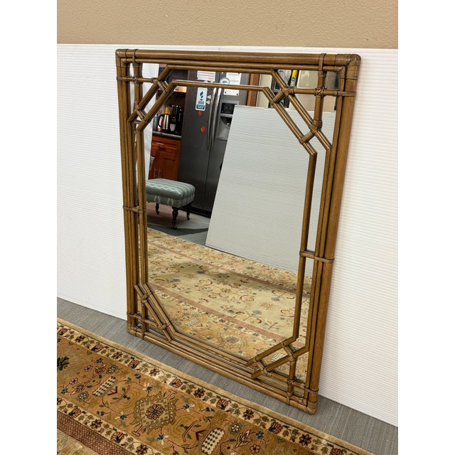 Design Plus Gallery presents a Faux Bamboo Wall Mirror with Hollywood Regency Style. The style of mirror has wonderful...
