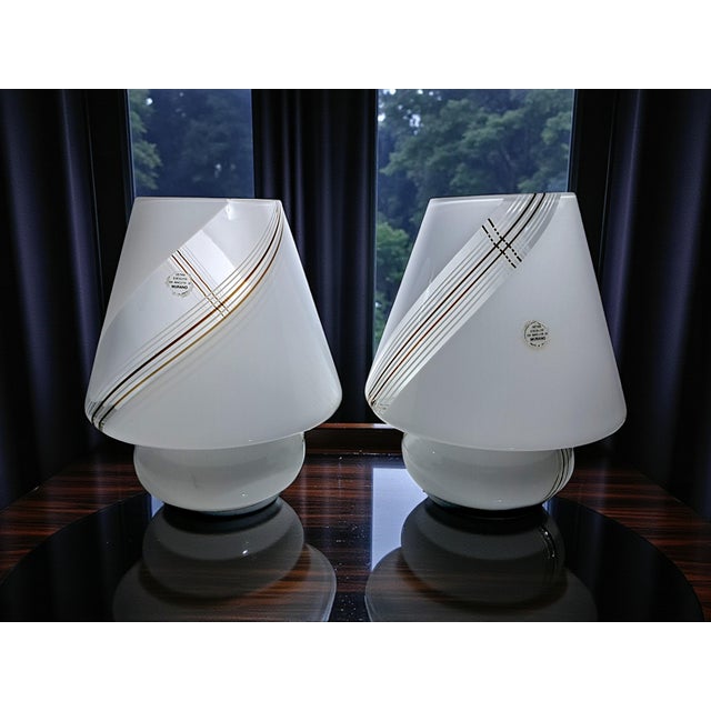 Light up your home with style with this stunning pair of vintage Murano glass lamps. Their iconic mushroom design, elegant...