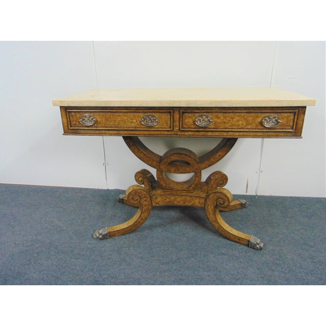 Hollywood Regency style console table made by Lineage Furniture. Tan marble top , base is leather with oil spot finish , 2...