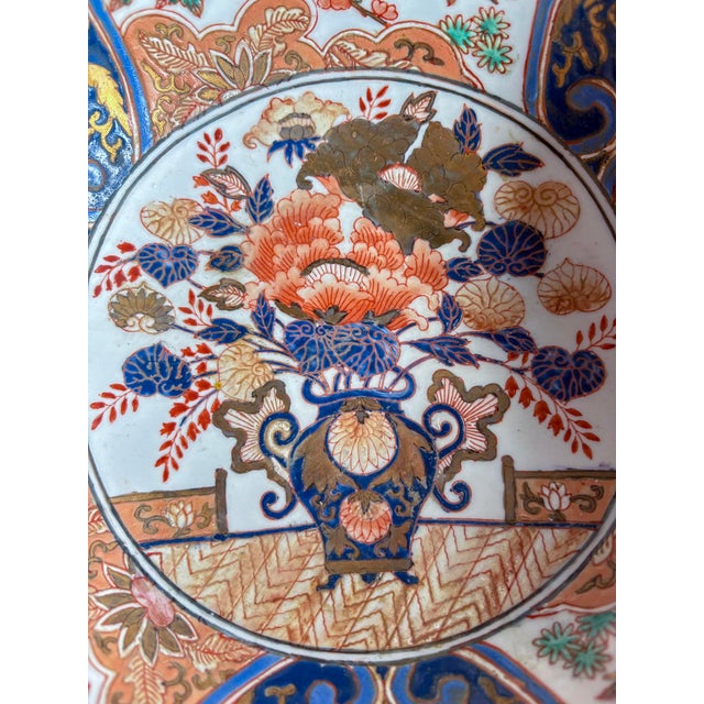 Late 19th Century Antique Japanese Imari Porcelain Bowl | Meiji Period | Lobed Form | Flower Basket & Phoenix Panels For Sale - Image 5 of 8