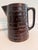 Vintage Mar-Crest Daisy Dot stoneware pitcher in rich Colorado Brown glaze, featuring embossed floral-and-dot motifs with...