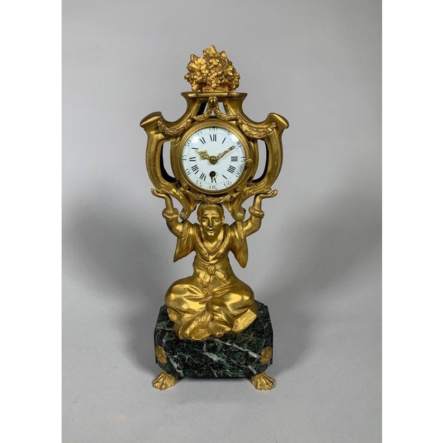 Chinese-style clock, Louis XV style, early 19th century For Sale