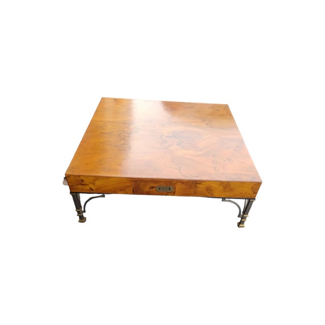 Vintage boho square burl olive wood coffee table. The coffee table us in the campaign style with 2 drawers with brass...