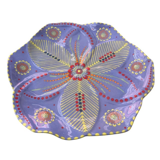 This stunning four-piece set of ceramic serving plates is a celebration of vibrant South African craftsmanship and...