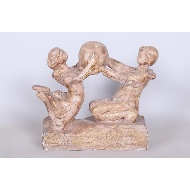 Artist: Karel Hájek This charming Czechoslovak sculpture titled "Children with a Ball" comes from the artistic legacy of...
