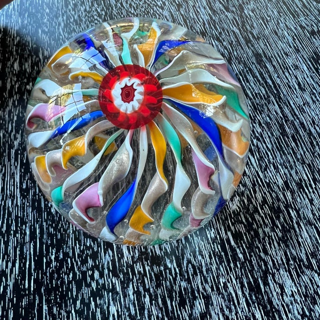 Vintage 1960's Venetian Murano Glass, Italy, paperweight with a vibrant ribbon twist design attributed to Fratelli Toso....