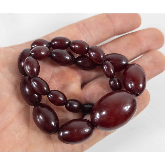 20th Century Art Deco Cherry Amber Bakelite Graduated Bead Necklace For Sale - Image 10 of 11