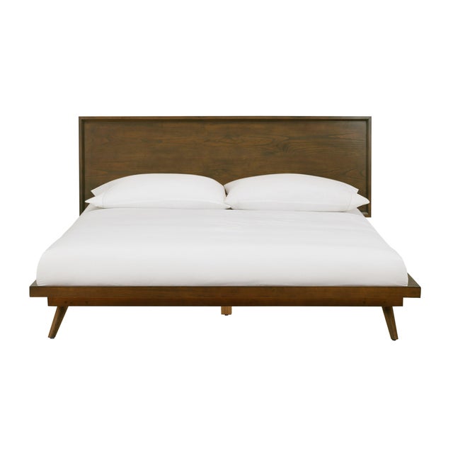 Mid-century inspiration meets warm, modern living in the Emery Walnut Bed. Finished in a rich walnut tone, its streamlined...