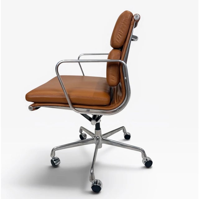 A beautifully restored Eames Aluminum Group Soft Pad Management Chair, originally designed by Charles & Ray Eames....