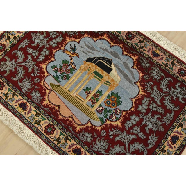 An authentic vintage traditional Tabriz rug hand-knotted with fine wool and natural dyes. This intricately woven rug...