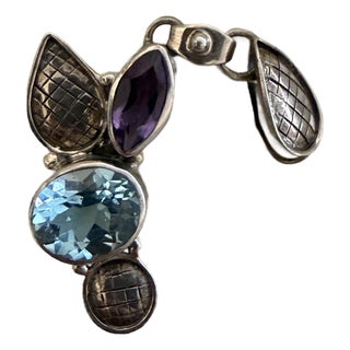 Vintage-Style Sterling Silver Pendant Set With Multi-Colored Gemstones and Textured Metal Accents For Sale