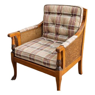 Regency Style Cane Bergère Armchair With Brass Lion Paw Feet, C. 1930s For Sale