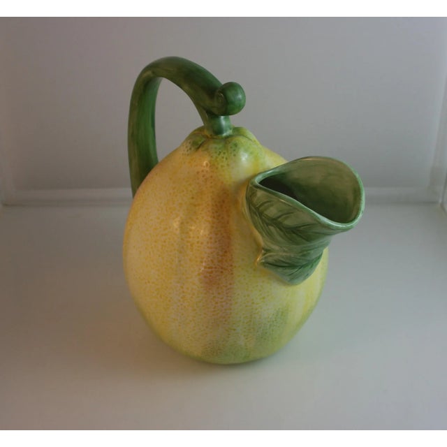 Vintage Hand Painted Sculpted Ceramic Pear Pitcher This beverage pitcher was artistically created to resemble a pear. The...
