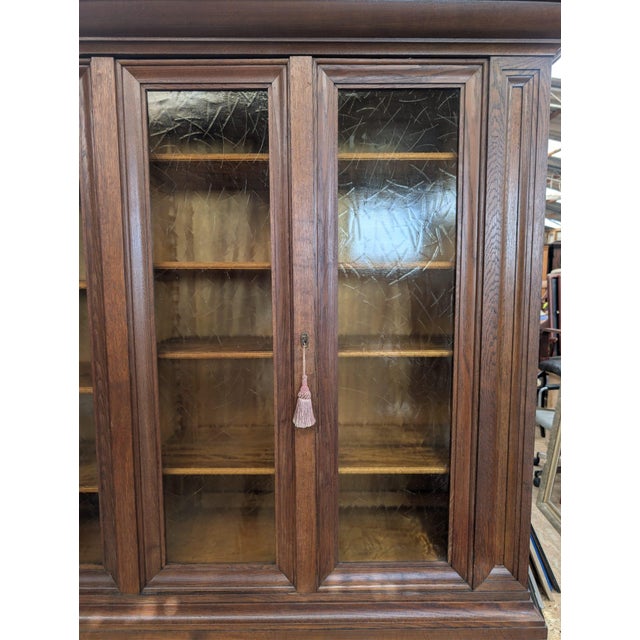 Antique oak display cabinet, bookcase from the interwar period Antique oak display cabinet from the interwar period. It...