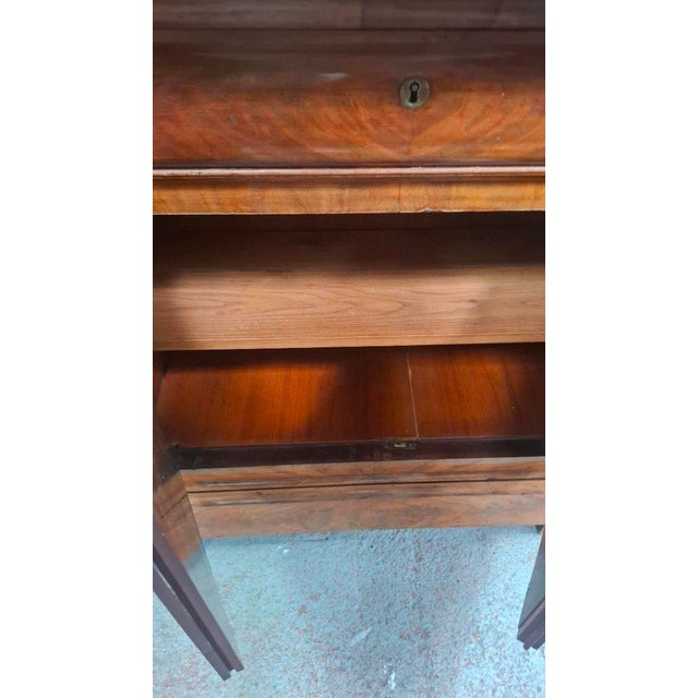 Very rare small mahogany buffet with a marble top, Louis Philippe period, featuring two doors and one drawer. It has an...