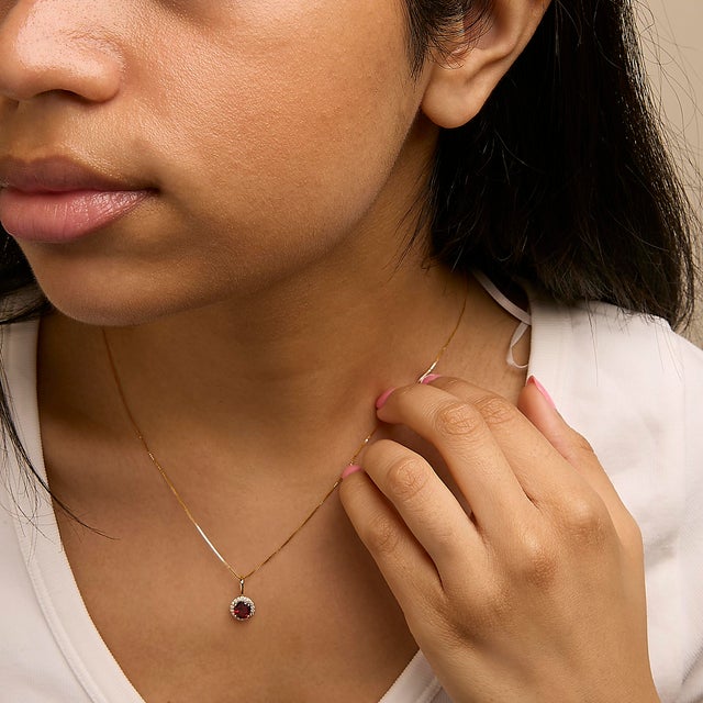 10K Yellow Gold Red Garnet and 1/10 Cttw Diamond Accent Halo Pendant Necklace For Sale - Image 4 of 5