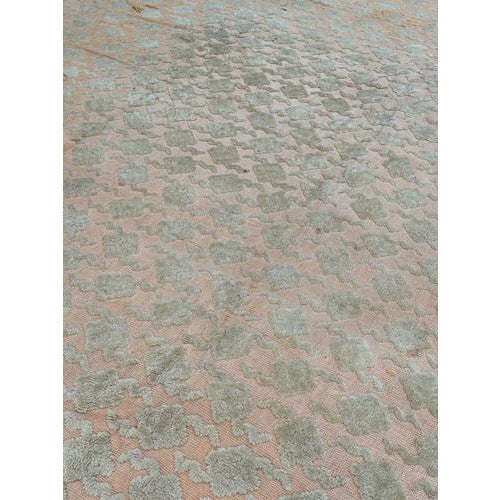 Beautiful mid century French Cogolin rug with a nice decorative and simple design, with a white pile of design on the...