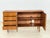 For sale is this beautiful, two-door teak sideboard with four drawers and slightly splayed legs, as shown in the attached...