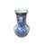This striking blue and white porcelain vase showcases a classic baluster form, characterized by a bulbous, lobed body that...