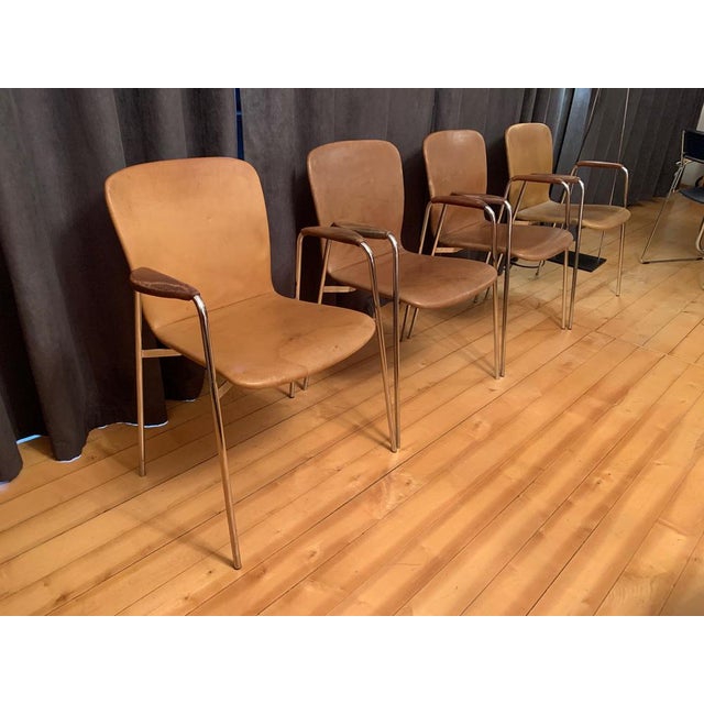 A set of four leather chairs from the 1960s. In original and very good condition. High quality workmanship made of natural...