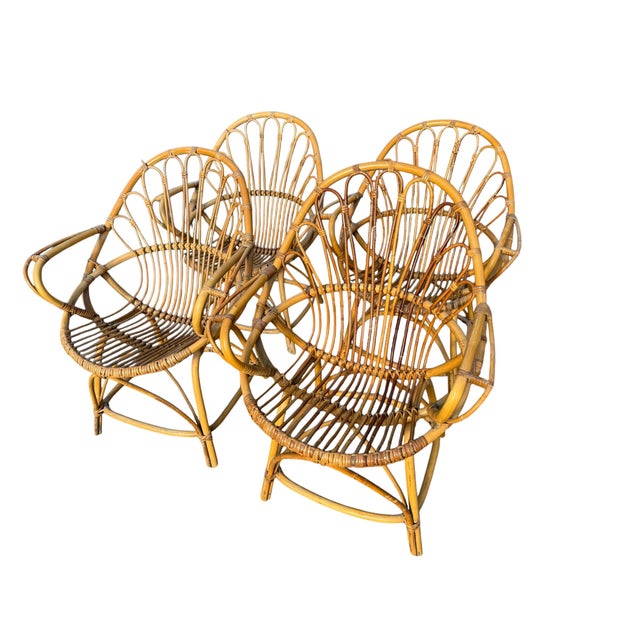 Set of 4 Magnificent Mid-Century French Bamboo and Rattan Lounge Chairs This set of four mid-century French lounge chairs...