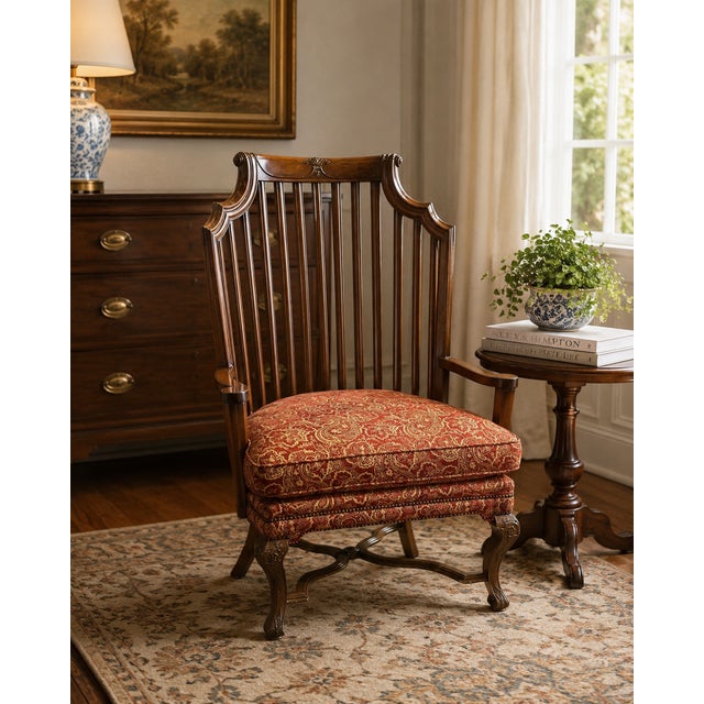 Elegant vintage armchair attributed to Baker Furniture featuring a dramatic sculptural spindle back with gracefully flared...
