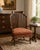 Elegant vintage armchair attributed to Baker Furniture featuring a dramatic sculptural spindle back with gracefully flared...