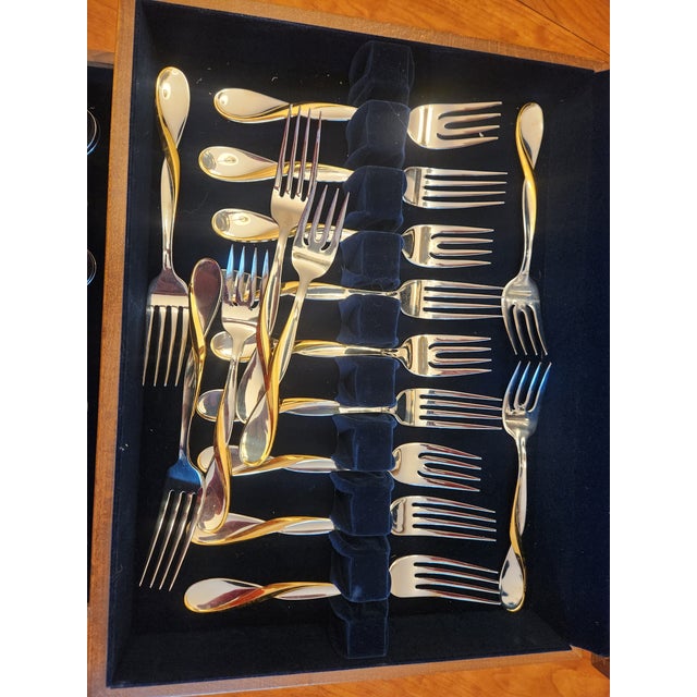 40 piece with box, serves 8. Add mid-century elegance to your dining room table with this striking vintage flatware...