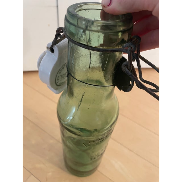 Green French Antique l'Ideale Bottle With Porcelain Top For Sale - Image 8 of 12