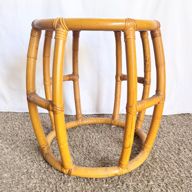 This Boho Chic circular drum stool exudes effortless coastal charm with its sculptural rattan frame and woven cane top....