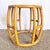 This Boho Chic circular drum stool exudes effortless coastal charm with its sculptural rattan frame and woven cane top....