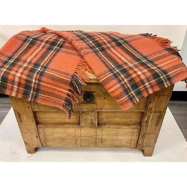 Merino Lambswool Knee Rug/Blanket In A Classic Muted Red Plaid Pattern- Made In England. Our knee blankets are cut to a...