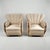 A rare pair of Danish Art Deco armchairs of generous proportions, retaining their original scallop-form backs and...