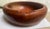 This is a great looking well made hand carved bowl made of red wood and having an overhanging edge. It has a wonderful...