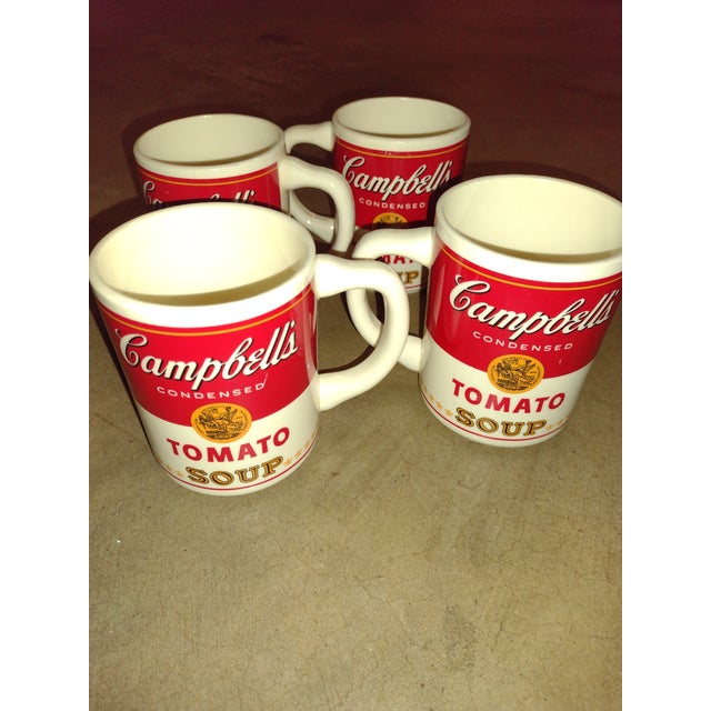 Four Vintage Campell's Condensed Tomato Soup Mugs. Made in the USA, from the 1960s. They have been in the back of the...