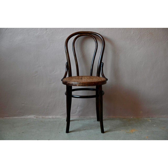 A retro, belle époque spirit pervades the atelier… this small bistro chair, no. 18, an icon of early industrial design,...