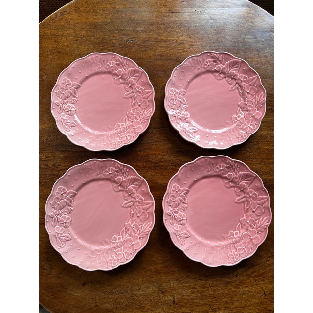 Add to your collection! Four 10.5-inch Ingrid Pink Bordello Pinheiro plates, a discontinued pattern, feature a foral,...