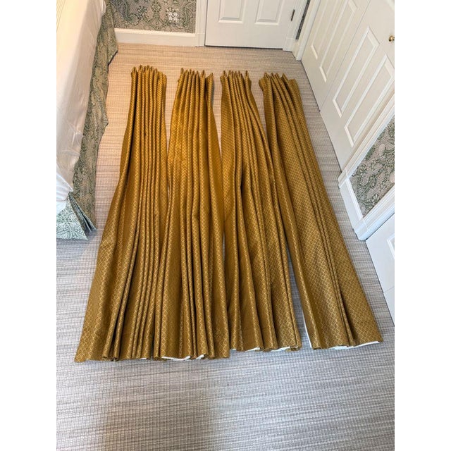Gorgeous pair of custom window treatments including pinch pleated, blackout lined panels and custom greek key valances....