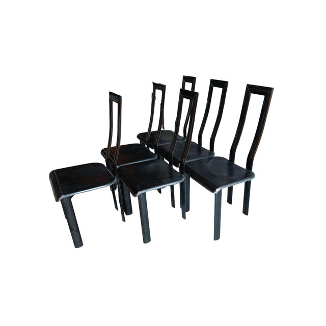 This complete set of 6 Ycami Regia dining chairs offers a refined touch of Italian design, combining black lacquered metal...
