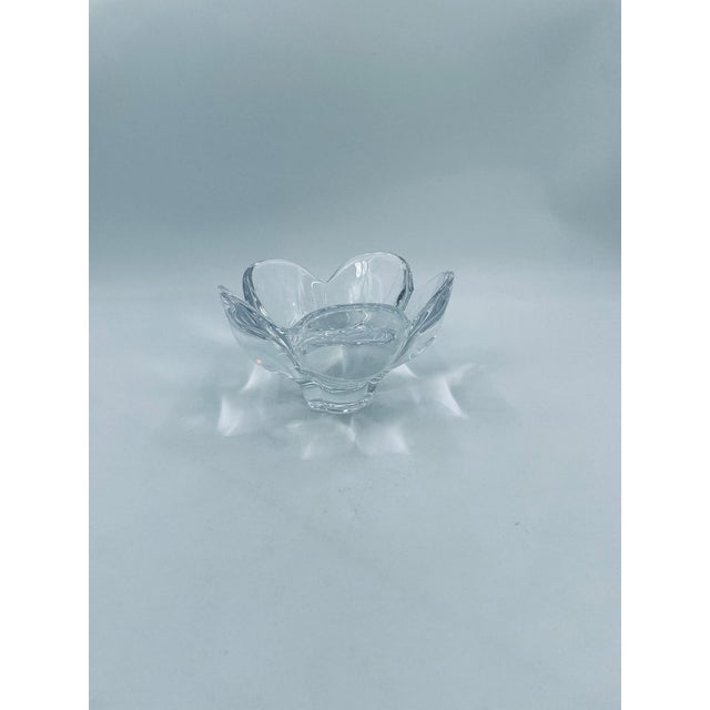 A decorative bowl from the Pomona series by Swedish glass art brand Orrefors, crafted from high-quality crystal glass. The...
