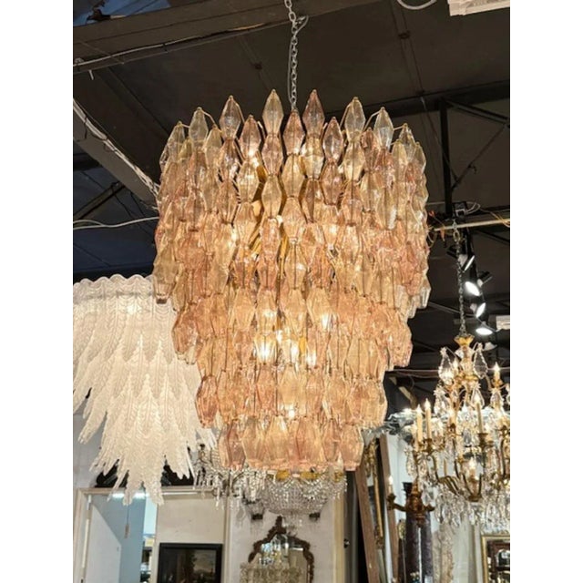 Gorgeous large scale modern Murano 2-tone glass poliheder waterfall chandelier in pink and champagne. The chandelier has...