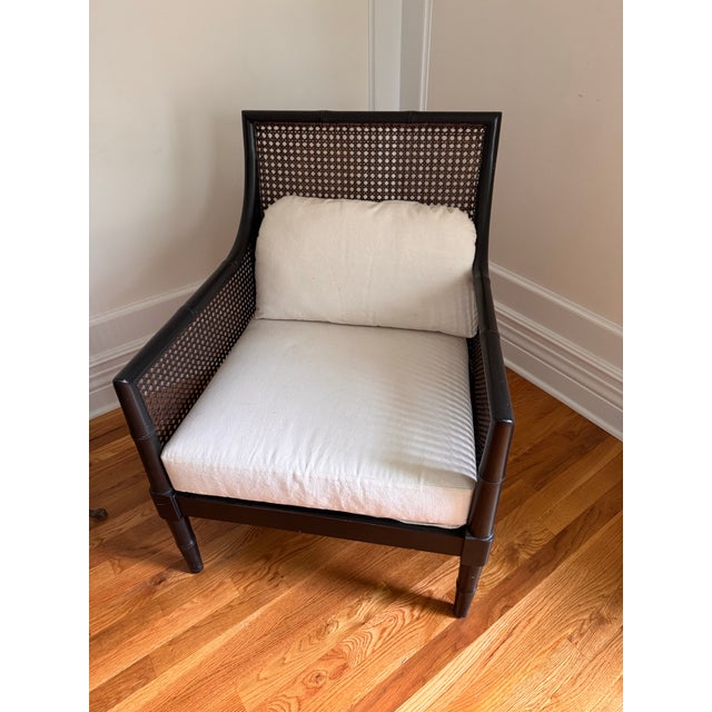 With its relaxed lines and airy caning, our inviting Cane Chair encourages you to linger a little longer. This casual arm...