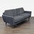 This Sits For Crate And Barrel 3-seat sofa features a sleek modern design in a dark gray fabric. It provides comfortable...