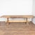 19th-century French oak dining table with substantial thick top and trestle base. Just under 10 feet long with substantial...