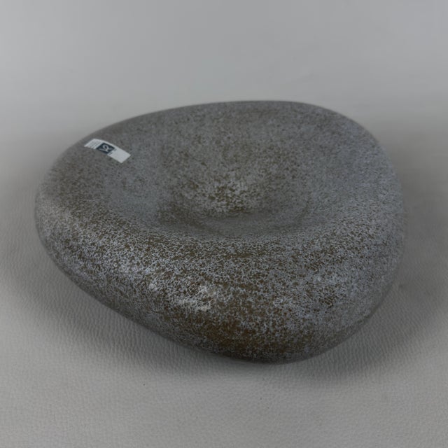 A refined furnishing element for lovers of modernist Italian design. This sculptural centerpiece stands out for its clean,...