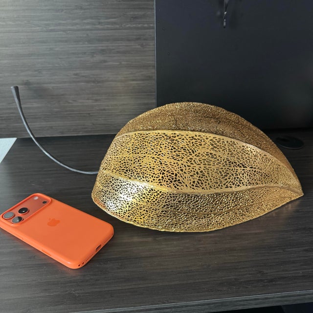 Beautiful Michael Aram design piece with unique shape. It is probably inspired by the form and texture found in foliage....